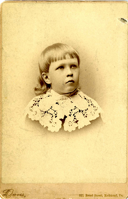 Photo of young boy in elaborate lace collar