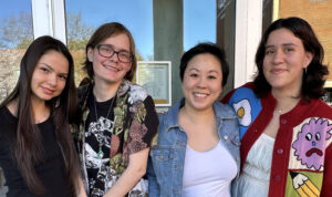 Winners of the 2025 contest pose in an informal photograph on the porch of Cabell Library